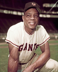 18 Aug 1954 --- Willie Mays of the New York Giants is shown here in this three-quarters length photo on one knee. --- Image by © Bettmann/CORBIS
